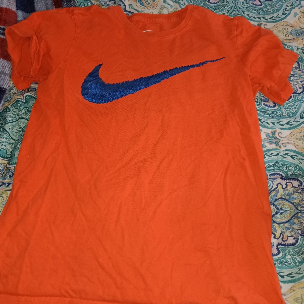 Orange and blue Nike tee